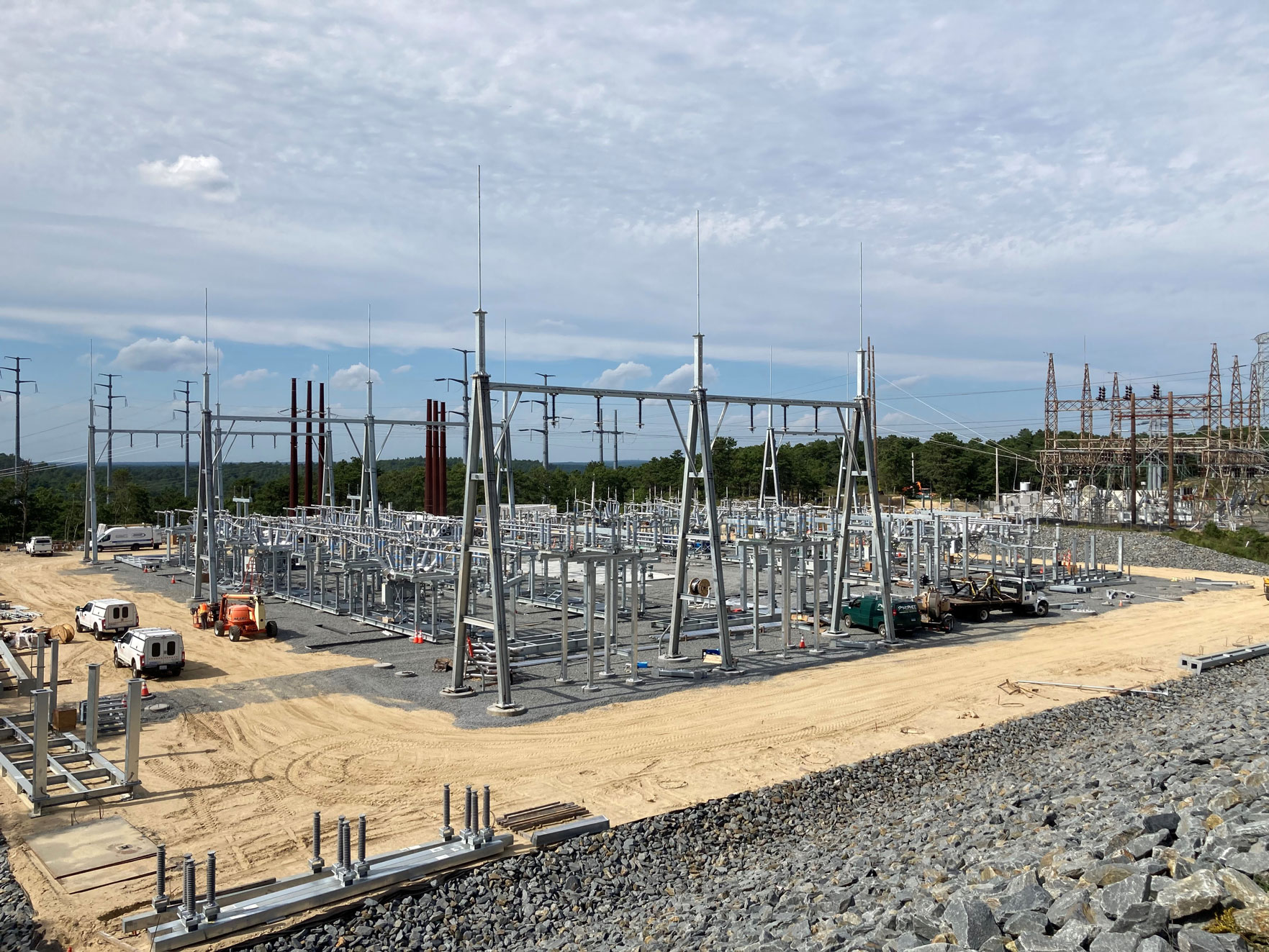 Steel lattice structures of a high-voltage electrical substation under construction by United Civil