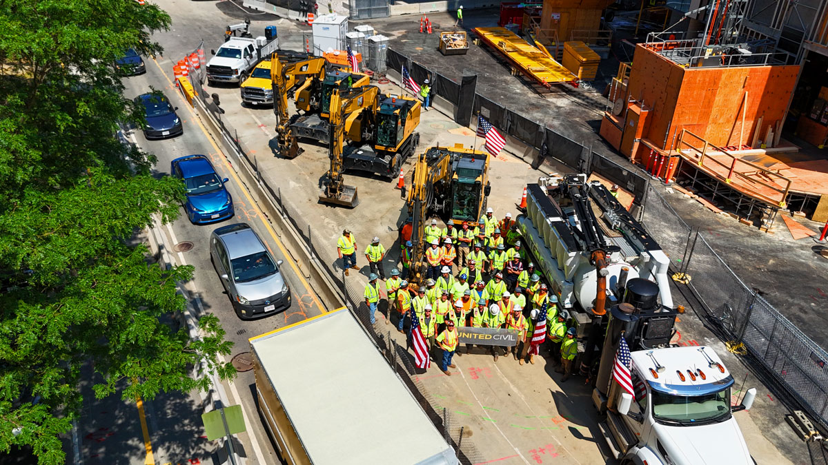 United Civil team assembled together on a utility construction jobsite, representing the company's collaborative crew culture