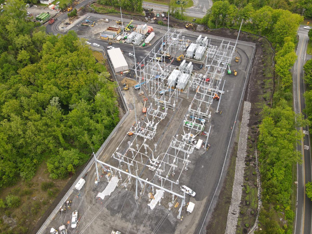 Aerial view of a completed electrical substation yard with equipment pads and access roads built by United Civil